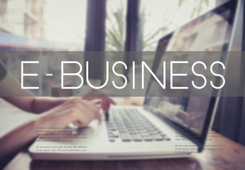 business hand typing on a laptop keyboard with E-business homepage on the computer screen digital E-commerce internet globa business concept.