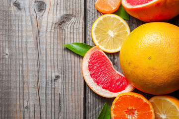 Citrus fruits - lemon, mandarin, grapefruit, top view, copy space