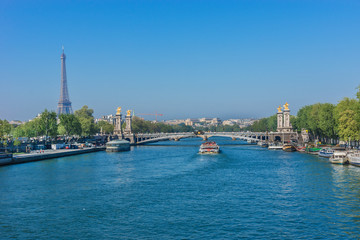 Seine River Embankments and Alexandre III bridge. Paris, France.