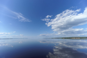 River view with clouds reflected in it, Volga, Russia