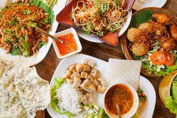 Five of Vietnamese dishes on wood table