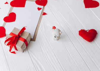 Valentine's Day. love letter, heart felt and decor on wooden background