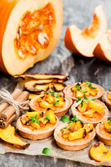 delicious  tartlets with baked honey pumpkin and cinnamon on rus