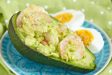 Stuffed avocado with garlic shrimp