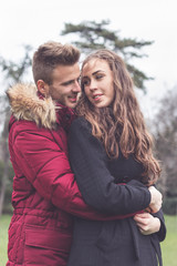 Young romantic couple having fun outdoors