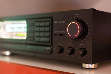 Stereo receiver with the volume knob turned up to the maximum