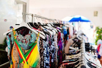 Colorful women's dresses on hanger