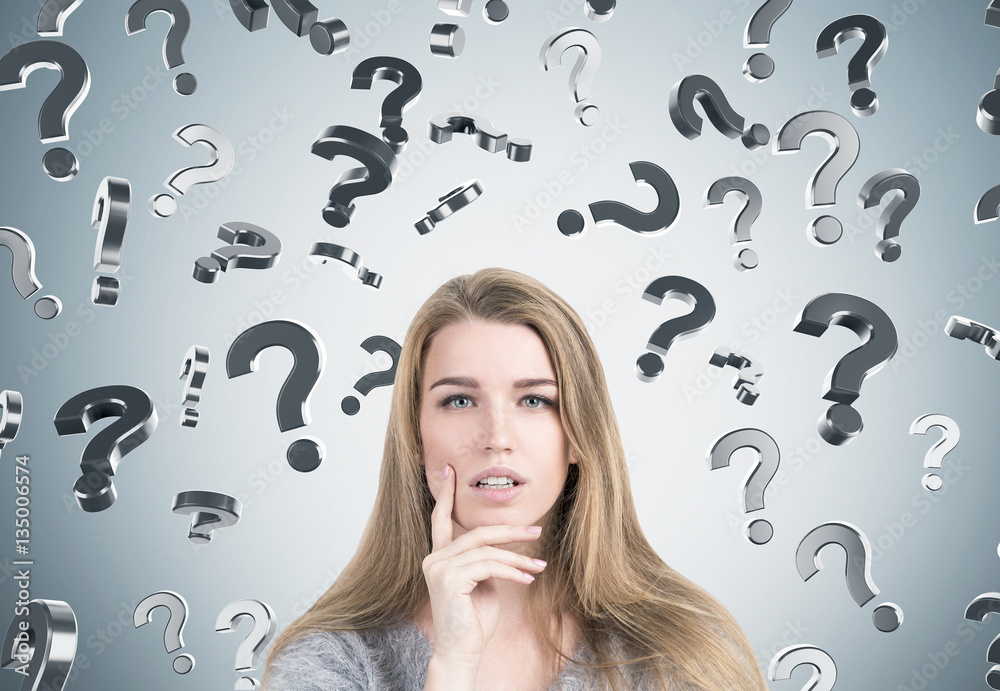 Wall mural Front view of woman and question marks falling