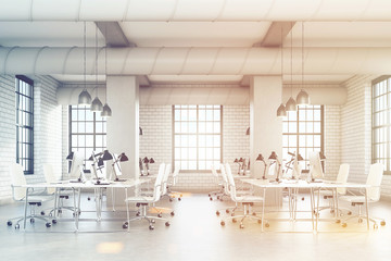 Loft office with pipes and columns, toned