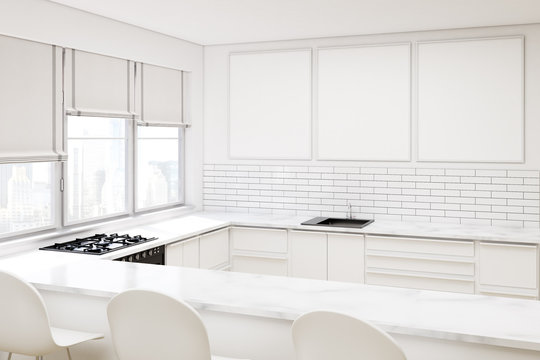 White kitchen with three posters
