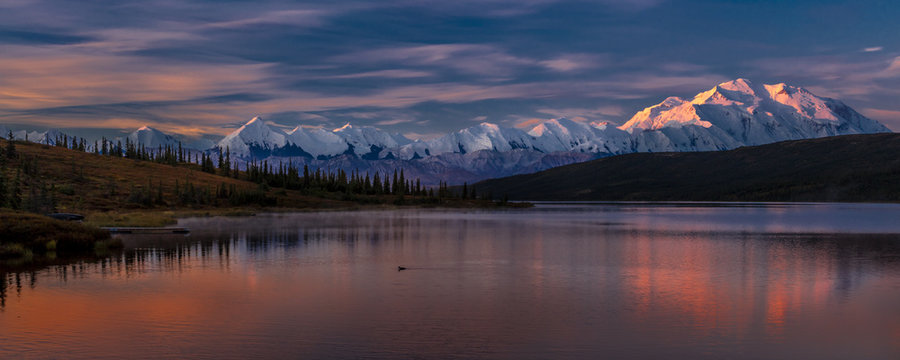 AUGUST 29, 2016 - Mount Denali at Wonder Lake, previously known as Mount McKinley, the highest mountain peak in North America, at 20, 310 feet above sea level. Located in the Alaska Range, Denali National Park and Preserve, Alaska - shot at Sunrise.