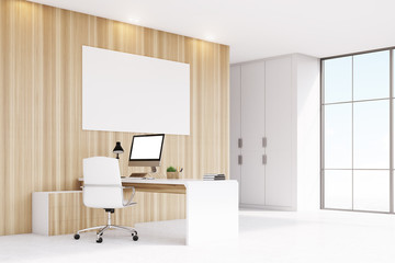 Corner of CEO office with window, computer