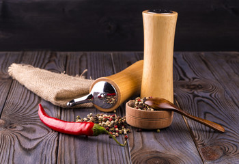 Red hot chili peppers on wooden backround