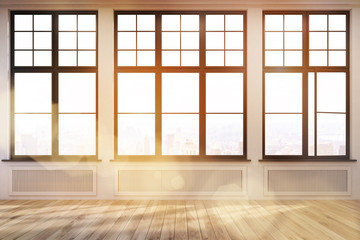 Empty room with three large windows in a beige wall. Wooden floor. Heating. Concept of a comfortable house. 3d rendering. Toned image