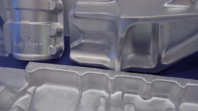 Rough metal castings for further finish machining on milling machines. Shot in motion
