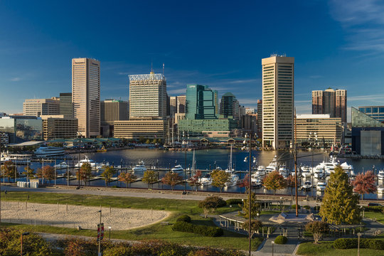 OCTOBER 28, 2016 - Baltimore Inner Harbor late afternoon lighting of ships and skyline, Baltimore, Maryland, shot from Federal Park Hill