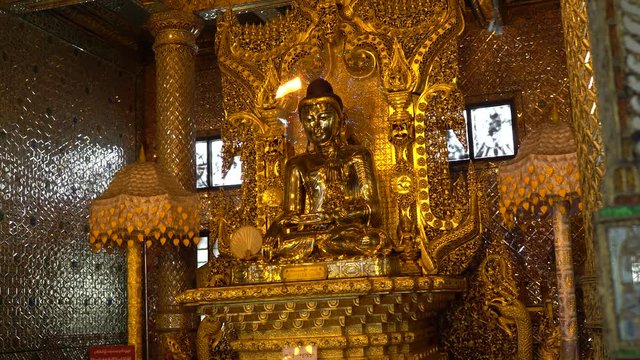 The golden image of Buddha in Botahtaung Pagoda in Yangon, Myanmar.