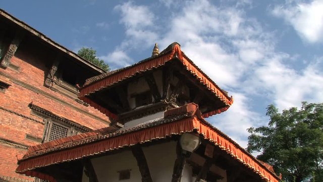 Rooftop of a temple within Nuwakot Durbar Square in Nepal clouds time lapse