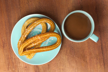 Churros with hot chocolate, traditional Spanish breakfast