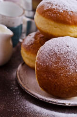 Traditional donuts with powdered sugar