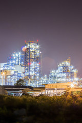 Night scene of oil and chemical refinery industrial plant