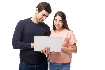 Couple using a laptop computer
