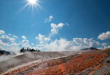 Steaming water run off from the Excelsior Geyser in Yellowstone National Park in Wyoming USA