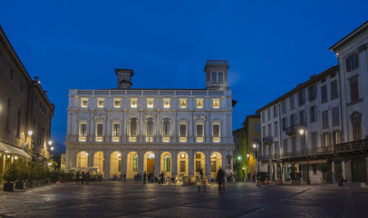 Obraz premium Bergamo - Old city (Citta Alta). One of the beautiful city in Italy. Lombardia. Landscape on the old main square (called Piazza Vecchia), the public library (called Angelo Mai) and Contarini fountain.