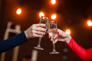 Celebration. People holding glasses of champagne making a toast