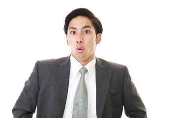 驚いた表情のビジネスマン