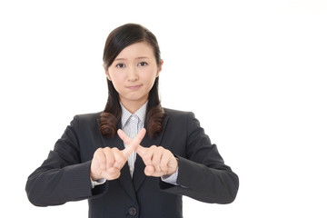 禁止の意思表示をする女性