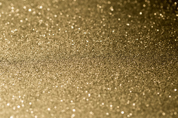 Golden glitter texture sparkle abstract background