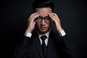 Businessman has head ache