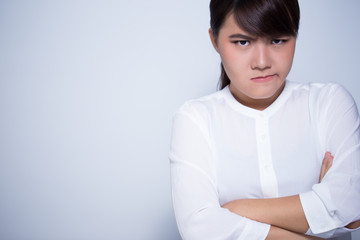 Angry woman on isolated background