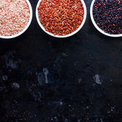 RThree types of rice bran shell: black, brown, red on a black background, square