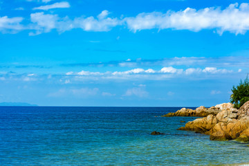 Fototapeta na wymiar Blue sea and a moving reflection of sunlight