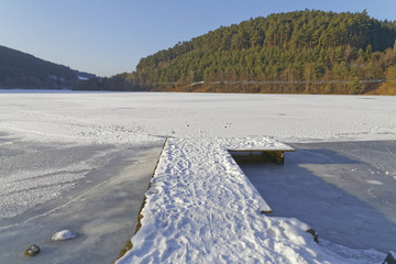 landing stage in a frozen lake