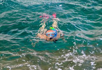 Young woman snorkeling