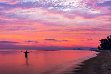 beach on vacation at sunset