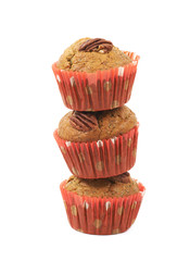 Pile of pecan nut muffins isolated