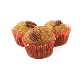 Pile of pecan nut muffins isolated