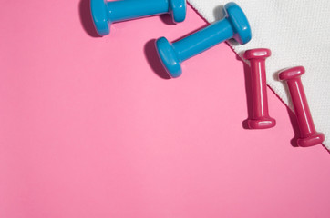 Sport, fitness and healthy lifestyle concept image on bright colorful background. Photograph taken from above, top view.