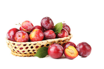 Fototapeta na wymiar Fresh plums isolated on a white
