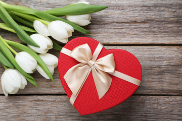 Bouquet of tulips on a grey wooden table