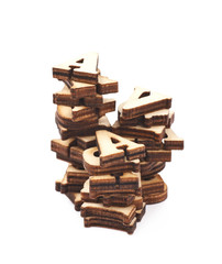 Pile of wood carved letters isolated