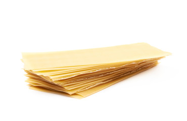 Pile of dried lasagna sheets isolated