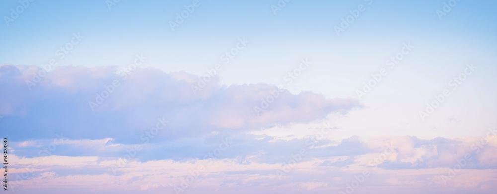 Wall mural sky background on sunset. nature composition. panoramic sunset sky background. sunrise sky with ligh