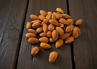 almonds on wooden surface