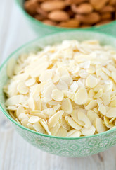 sliced almonds on wooden surface