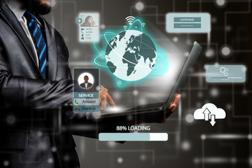 Businessman touching laptop technology with global.